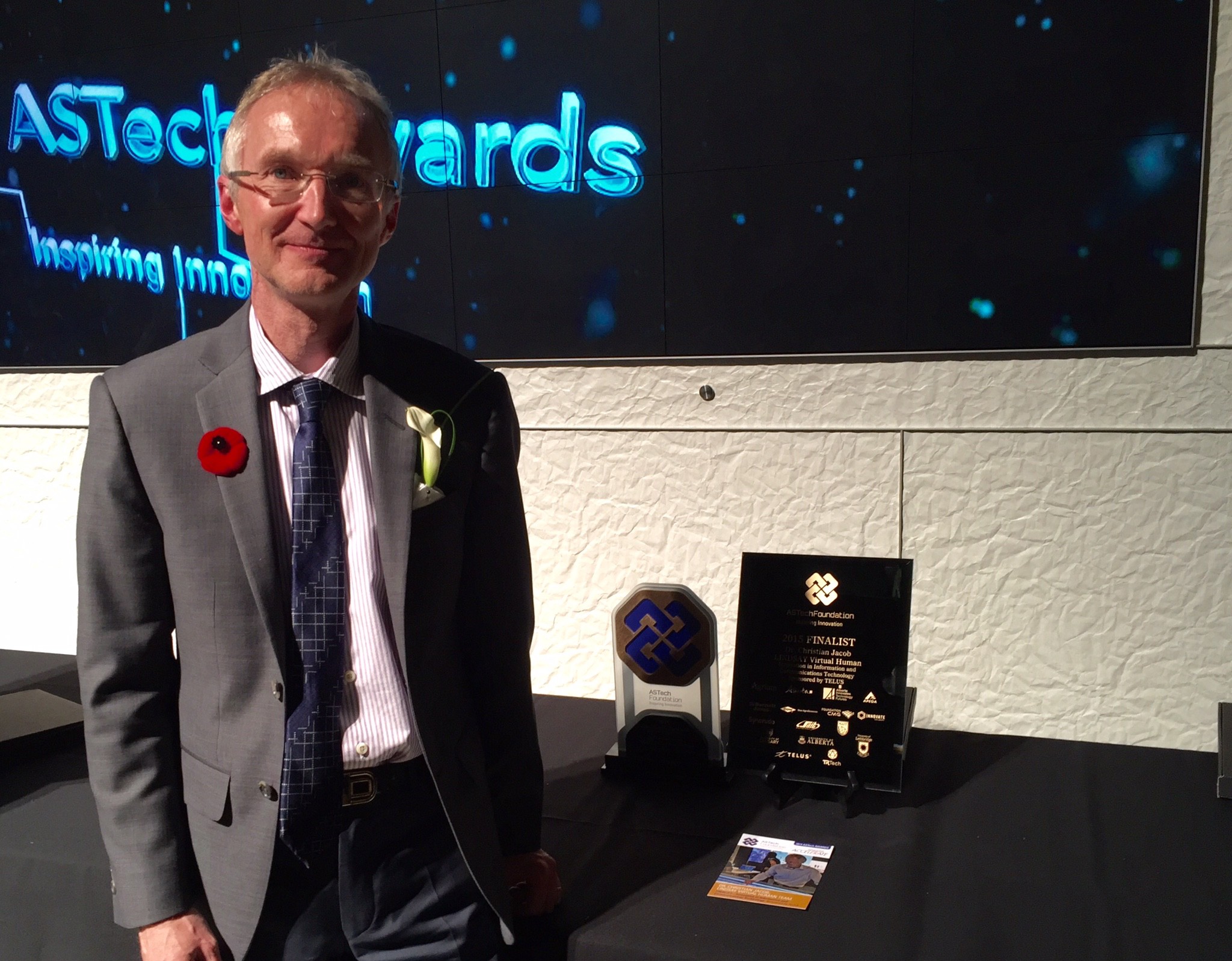 Proudly showing off our plaque and winner's trophy